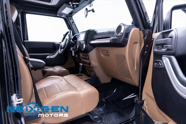 Photo of 2011 Black Clearcoat Jeep Wrangler Unlimited