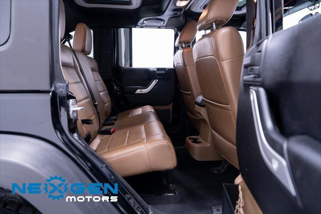 Photo of 2011 Black Clearcoat Jeep Wrangler Unlimited