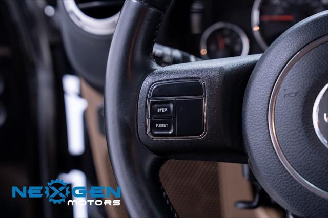 Photo of 2011 Black Clearcoat Jeep Wrangler Unlimited