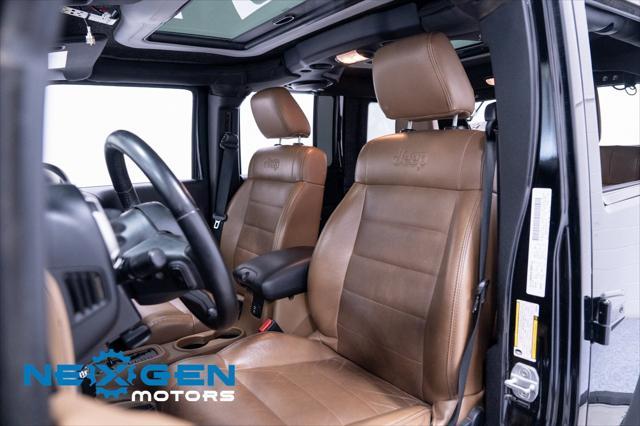 Photo of 2011 Black Clearcoat Jeep Wrangler Unlimited
