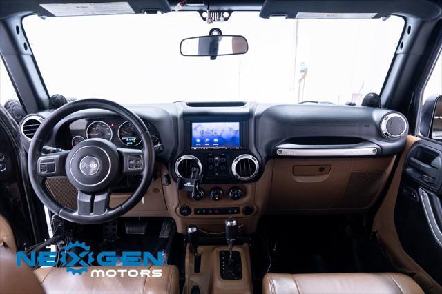 Photo of 2011 Black Clearcoat Jeep Wrangler Unlimited