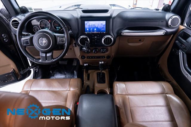 Photo of 2011 Black Clearcoat Jeep Wrangler Unlimited