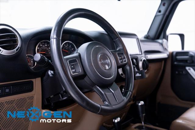 Photo of 2011 Black Clearcoat Jeep Wrangler Unlimited