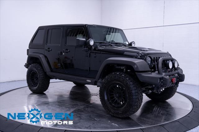 Photo of 2011 Black Clearcoat Jeep Wrangler Unlimited