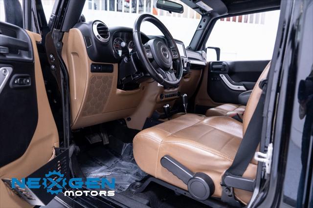 Photo of 2011 Black Clearcoat Jeep Wrangler Unlimited