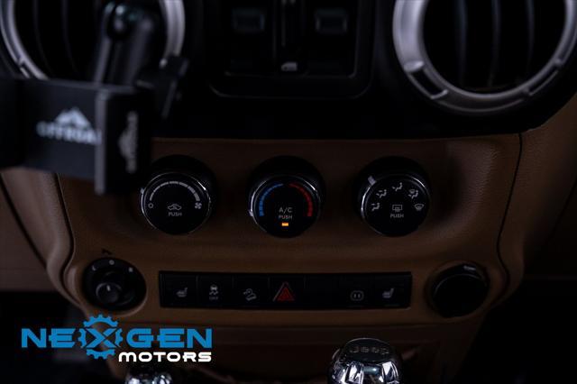 Photo of 2011 Black Clearcoat Jeep Wrangler Unlimited