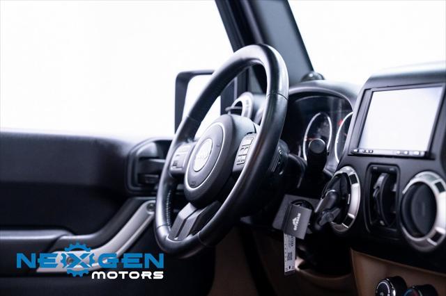 Photo of 2011 Black Clearcoat Jeep Wrangler Unlimited