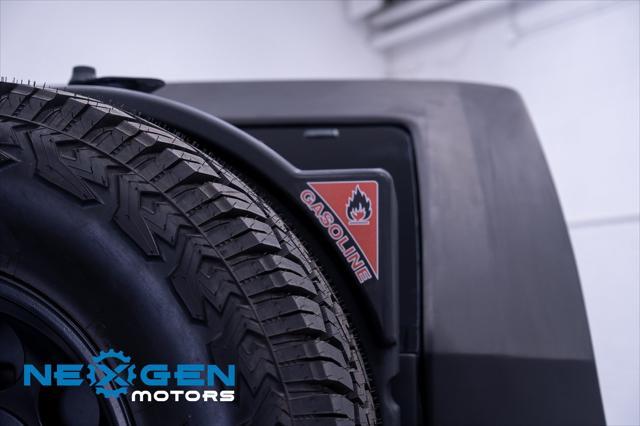 Photo of 2011 Black Clearcoat Jeep Wrangler Unlimited