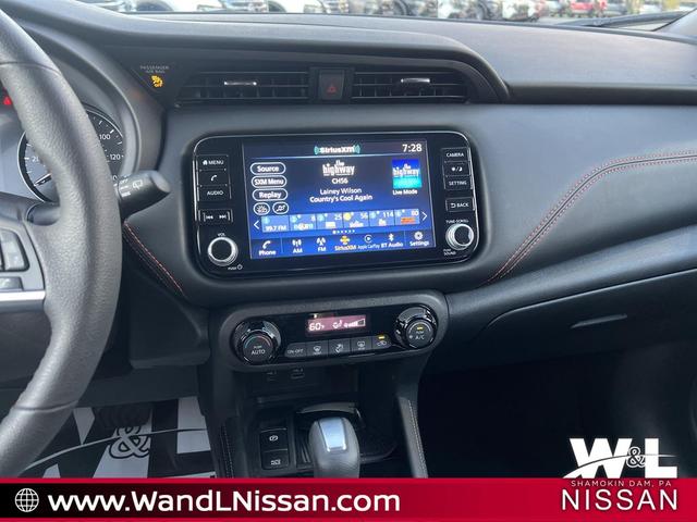 Photo of 2024 Aspen White Tricoat/Super Black Nissan Kicks