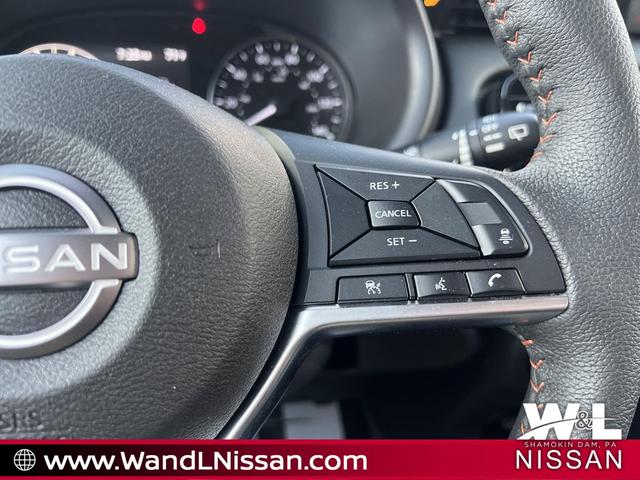 Photo of 2024 Aspen White Tricoat/Super Black Nissan Kicks
