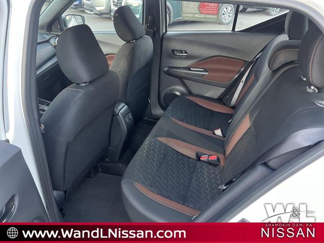Photo of 2024 Aspen White Tricoat/Super Black Nissan Kicks
