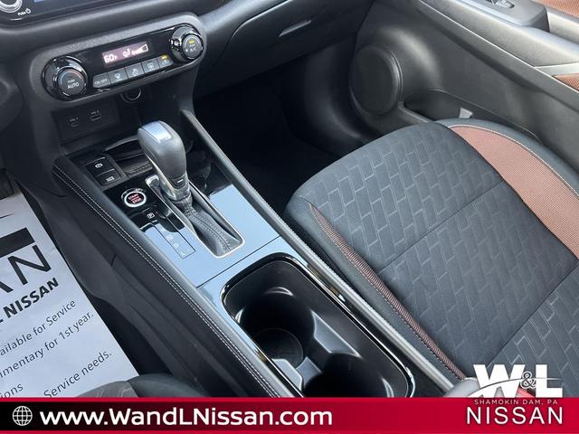 Photo of 2024 Aspen White Tricoat/Super Black Nissan Kicks