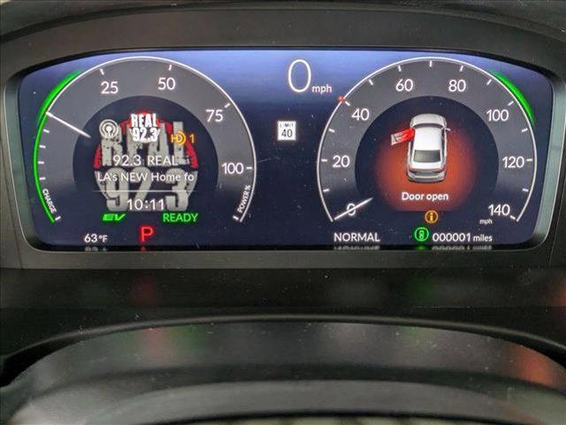 Photo of 2025 Blue Lagoon Pearl Honda Civic Hybrid