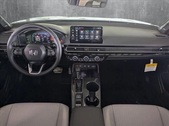 Photo of 2025 Blue Lagoon Pearl Honda Civic Hybrid