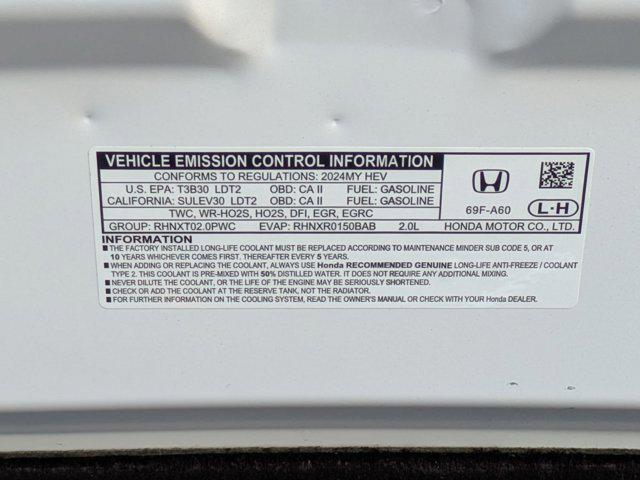 Photo of 2024 Platinum White Pearl Honda CR-V Hybrid