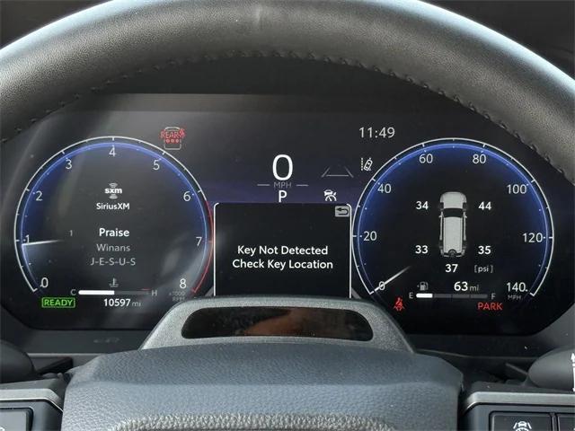 Photo of 2024 Heritage Blue/Gray Scape Toyota Land Cruiser