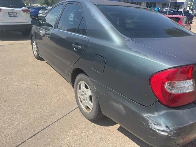 Photo of 2003 Stratosphere Mica Toyota Camry