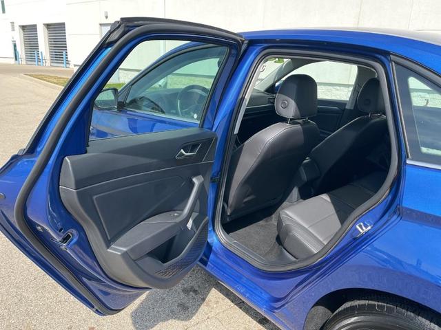 Photo of 2024 Rising Blue Metallic Volkswagen Jetta