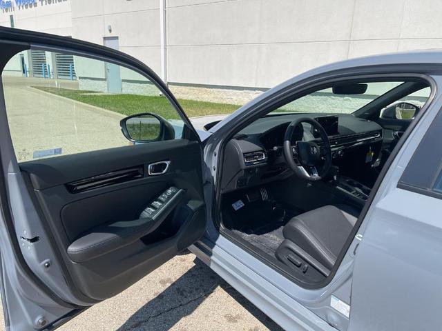 Photo of 2026 Urban Gray Pearl Honda Civic Hybrid