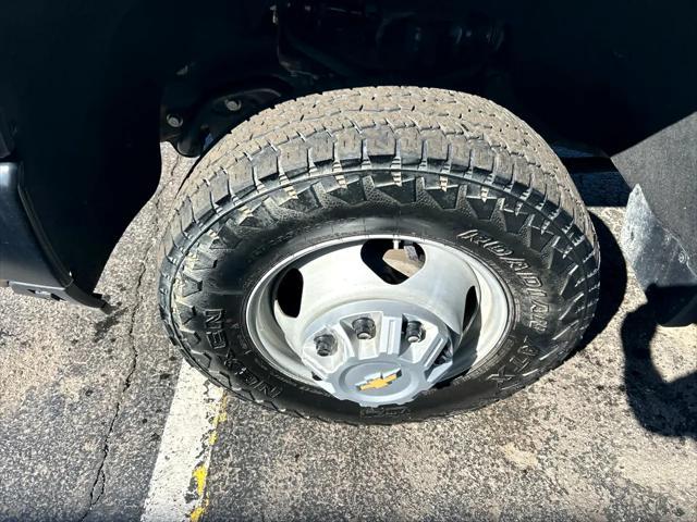 Photo of 2024 Summit White Chevrolet Silverado 3500