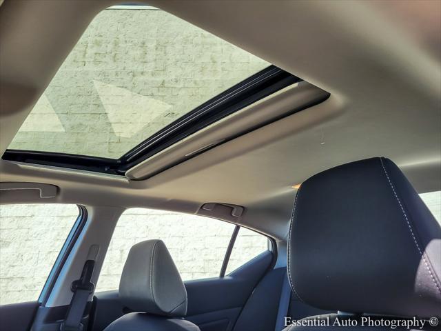 Photo of 2023 Pearl White Tricoat Nissan Altima