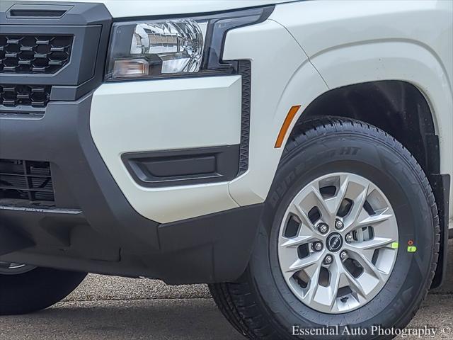 Photo of 2025 Glacier White Nissan Frontier