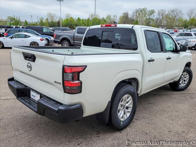 Photo of 2025 Glacier White Nissan Frontier