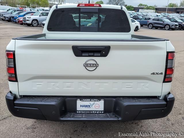 Photo of 2025 Glacier White Nissan Frontier