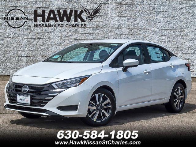 Photo of 2025 Aspen White Tricoat Nissan Versa
