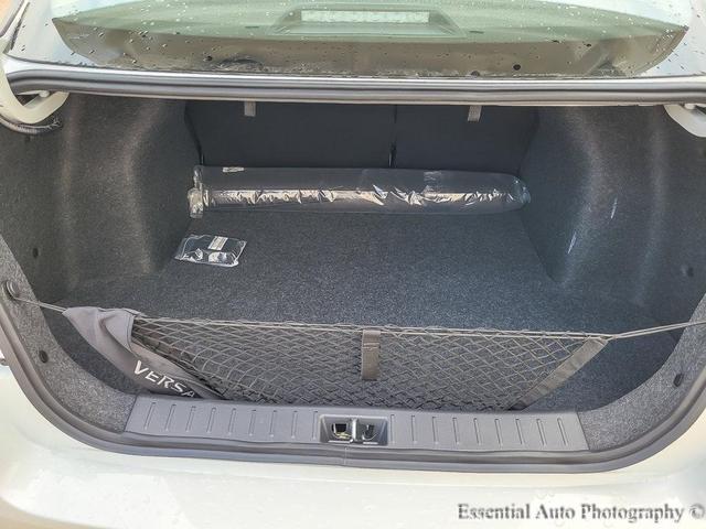Photo of 2025 Aspen White Tricoat Nissan Versa