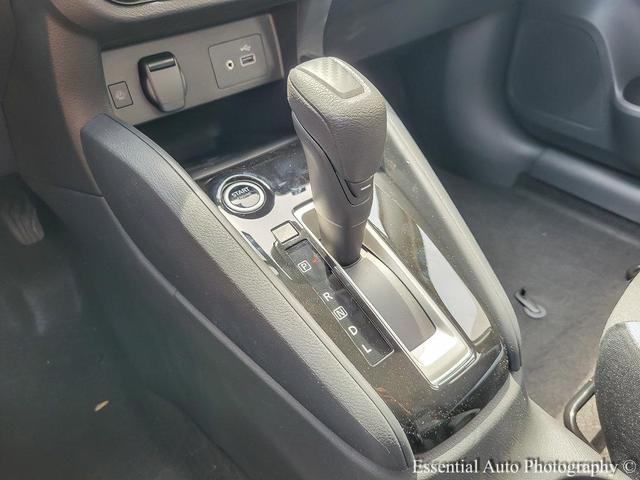 Photo of 2025 Aspen White Tricoat Nissan Versa