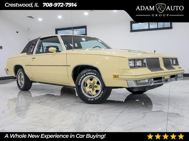 Photo of 1986 Yellow Oldsmobile Cutlass