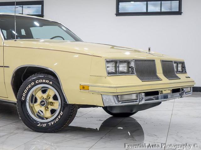 Photo of 1986 Yellow Oldsmobile Cutlass