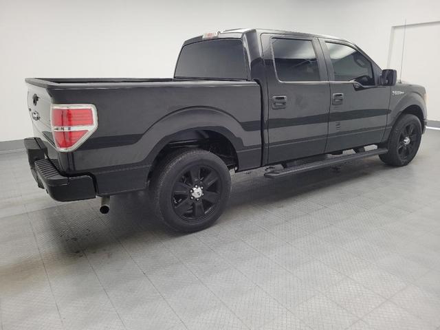 Photo of 2014 Tuxedo Black Metallic Ford F-150