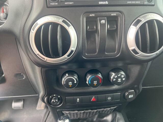 Photo of 2012 Natural Green Pearlcoat Jeep Wrangler