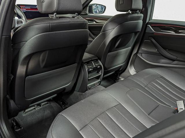 Photo of 2022 Carbon Black Metallic BMW 540