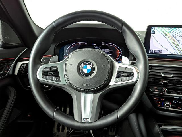 Photo of 2022 Carbon Black Metallic BMW 540