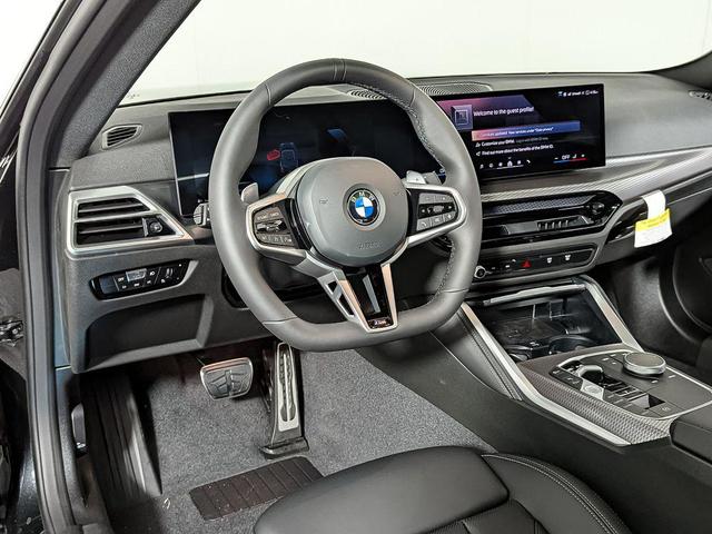 Photo of 2025 Black Sapphire Metallic BMW 230