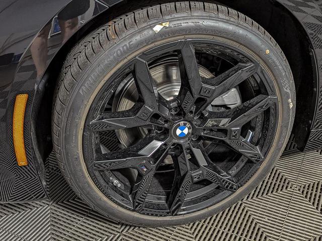 Photo of 2025 Black Sapphire Metallic BMW 230