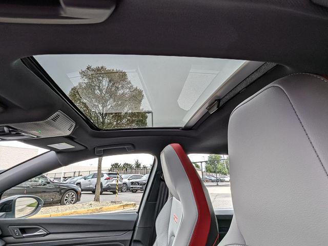 Photo of 2024 Opal White Pearl/Black Roof Volkswagen Golf GTI
