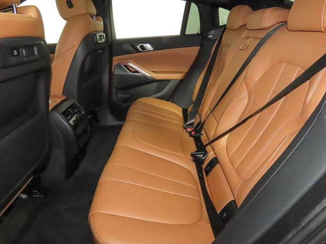 Photo of 2022 Flamenco Red Metallic BMW X6