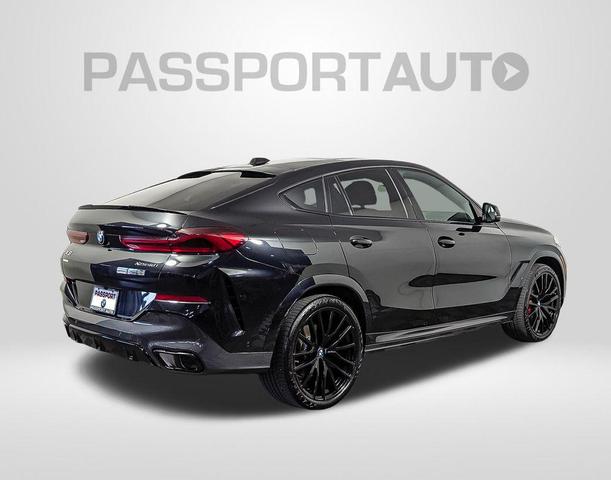Photo of 2024 Black Sapphire Metallic BMW X6