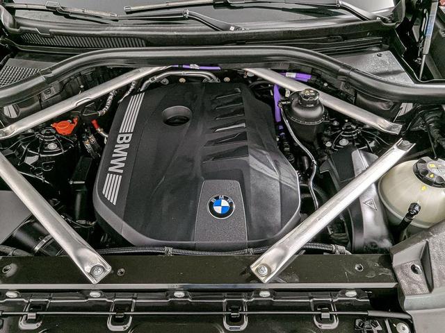 Photo of 2024 Black Sapphire Metallic BMW X6