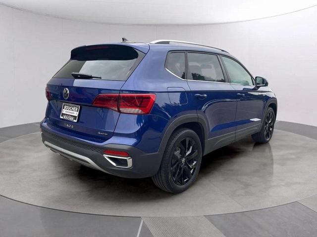 Photo of 2022 Dusk Blue Metallic Volkswagen Taos