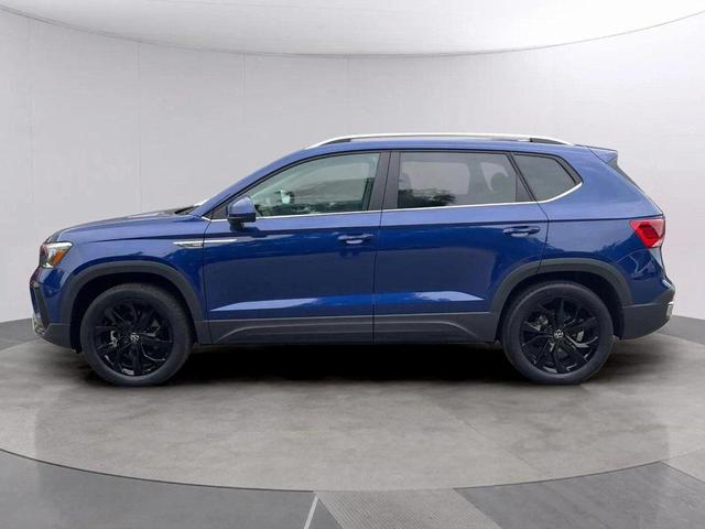 Photo of 2022 Dusk Blue Metallic Volkswagen Taos