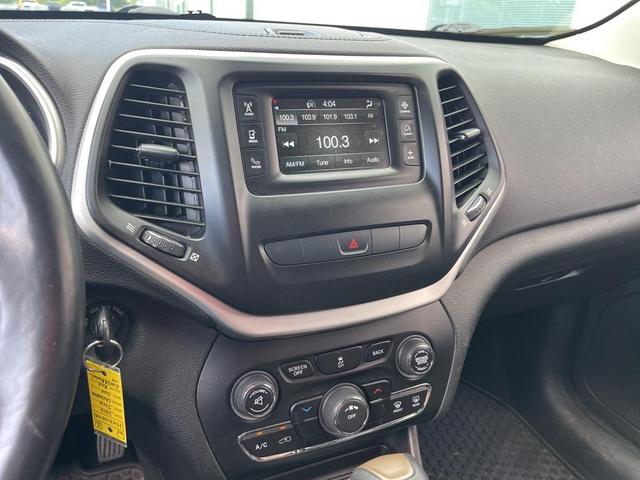 Photo of 2014 Deep Cherry Red Crystal Pearlcoat Jeep Cherokee
