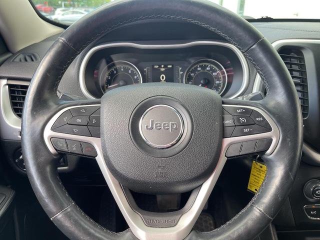 Photo of 2014 Deep Cherry Red Crystal Pearlcoat Jeep Cherokee