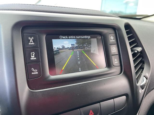 Photo of 2014 Deep Cherry Red Crystal Pearlcoat Jeep Cherokee