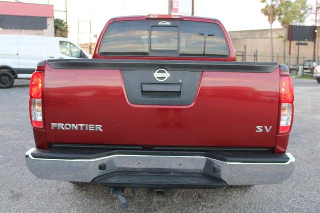 Photo of 2019 Cayenne Red Metallic Nissan Frontier