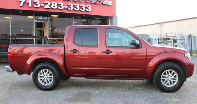 Photo of 2019 Cayenne Red Metallic Nissan Frontier